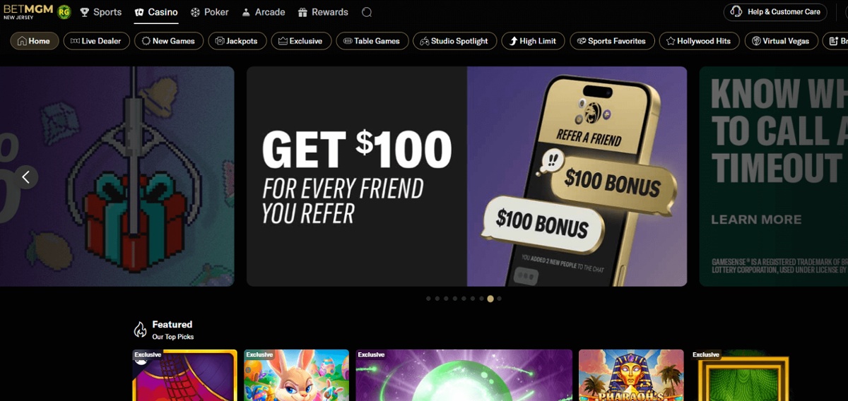 The MGM games lobby with a friend referral bonus offer showing in the banner.